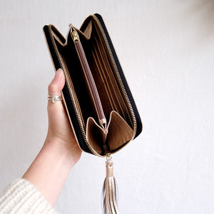 WOMAN'S ZIP AROUND WALLET ROSE GOLD