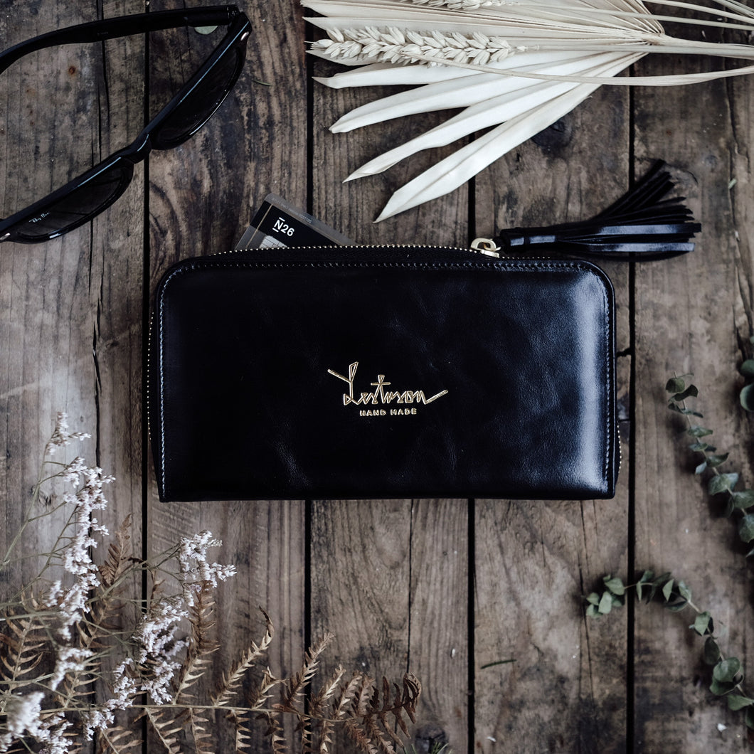 WOMAN'S ZIP AROUND WALLET BLACK/RED